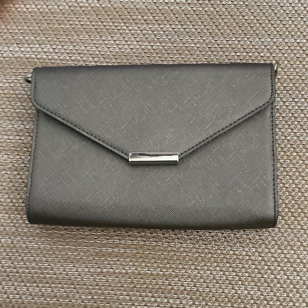 Clutch purse that holds your cell phone